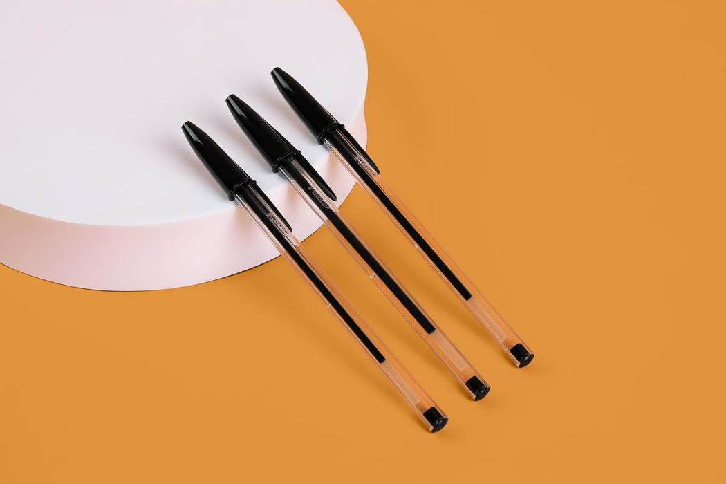 BIC Penne a Sfera Cristal Original con Punta Media (1,00 mm) e Tappi Abbinati al Colore dell’Inchiostro - Nero, Confezione da 10