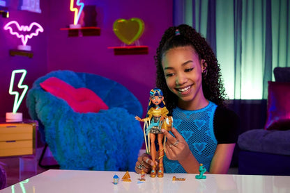 Monster High Cleo De Nile Doll in Golden Blouse & Layered Skirt, Includes Pet Cobra Hissette & Accessories Like a Backpack, Snack & Scroll