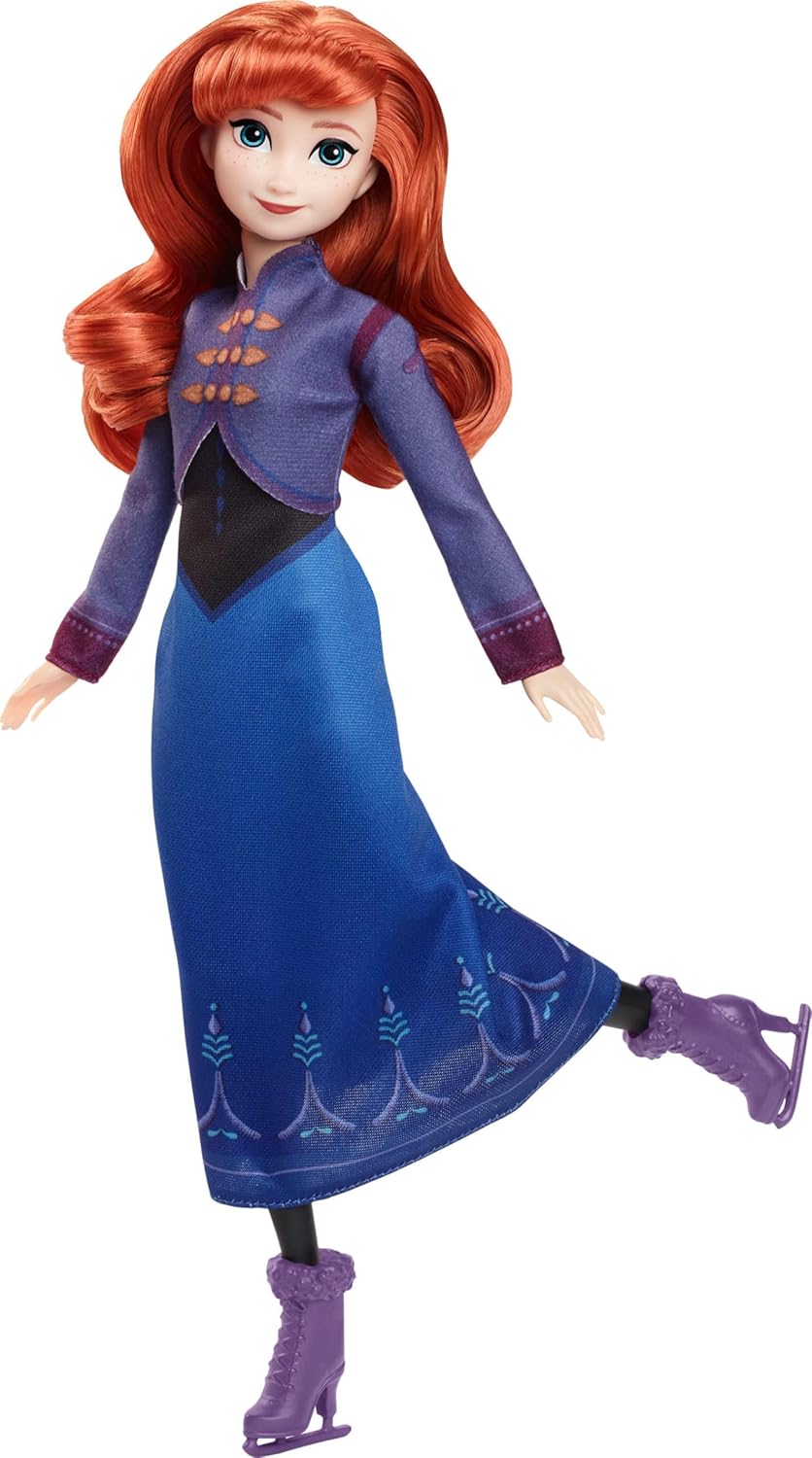 Mattel Disney Frozen Anna modepop en accessoires, schaatslook met jurk en schaatsen (die aan en uit kunnen), plus 1 paar schoenen, geïnspireerd op Frozen: Winterfestival, JBG54