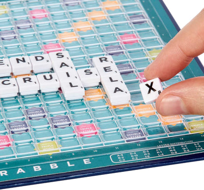 Mattel Games Scrabble Travel Game, Portable and Compact, 2-4 Players, Includes Playing Board, 4 Racks, 100 Letter Tiles, a Tile Bag, and Rules, 10Y+, CJT11(Packaging May Vary)