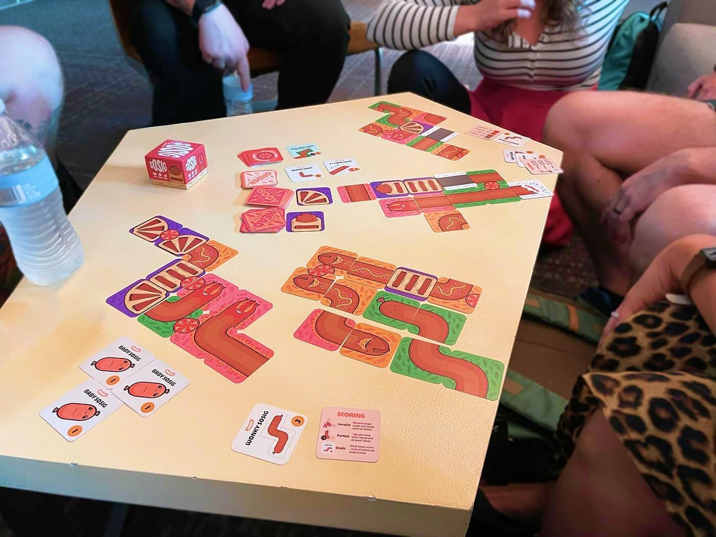 Joking Hazard Sosig Card Game - 120+ Family-Friendly Cards for Kids & Adults, Build the Tastiest Sosig with Fun & Strategy, Includes Mystery Meat Sabotage Cards & Goal Cards