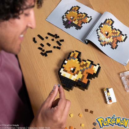 MEGA Pokémon Pixel Art Eevee Bloques de construcción, estilo retro basado en el videojuego de los 90, 323 piezas, juguete para coleccionistas +13 años (HTH78)