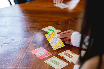 USAopoly | Flip 7 | Party Card Game | Ages 8+ | 3+ Players | 20+ Minutes Playing Time