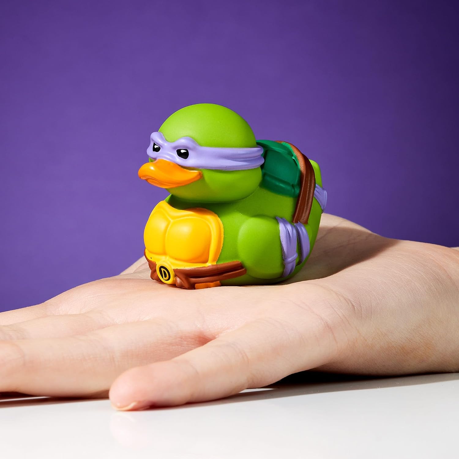 TUBBZ Mini: Teenage Mutant Ninja Turtles - Donatello Figura Mini Coleccionable de Pato de Goma Disfrazado
