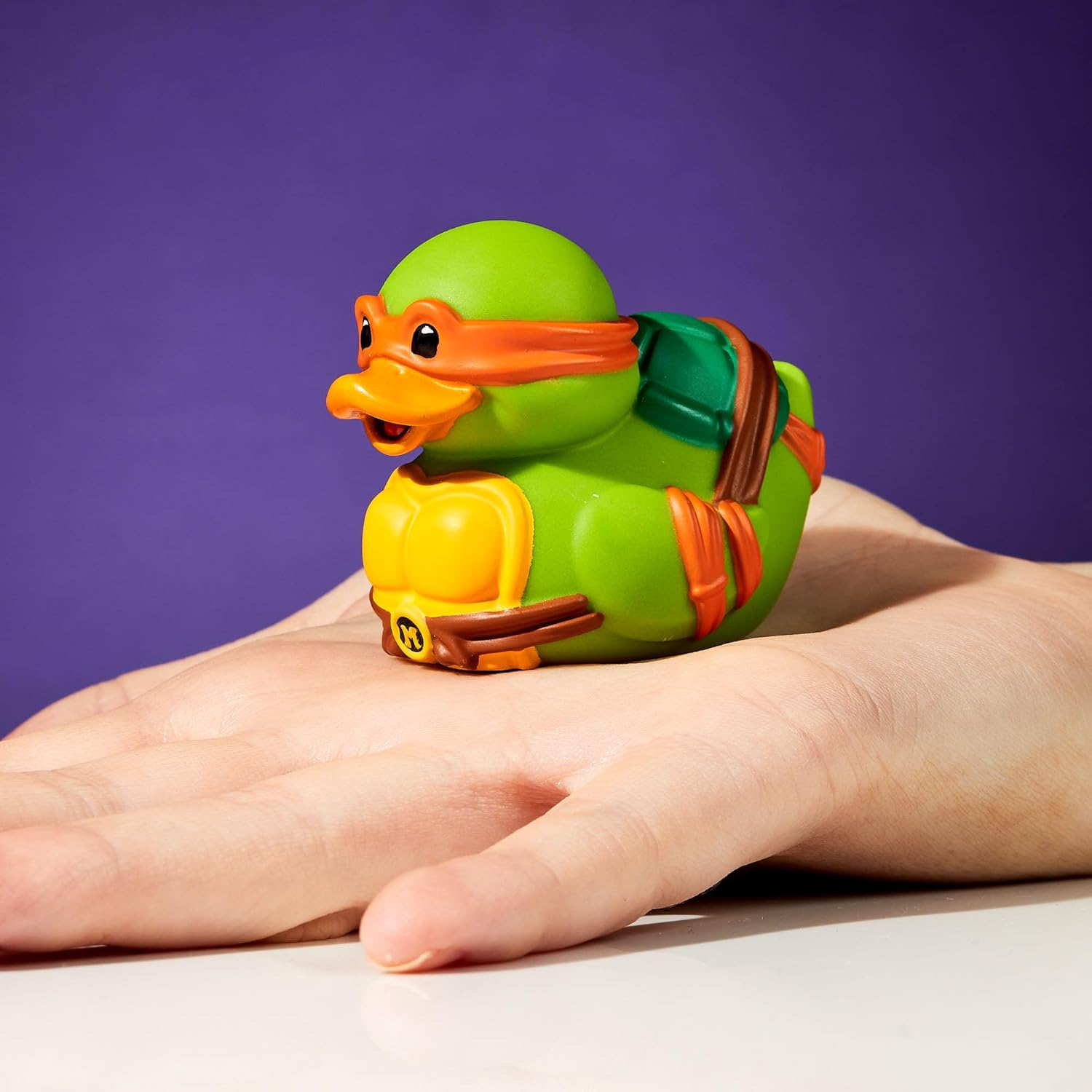 TUBBZ Mini: Teenage Mutant Ninja Turtles - Michelangelo Figura Mini Coleccionable de Pato de Goma Disfrazado