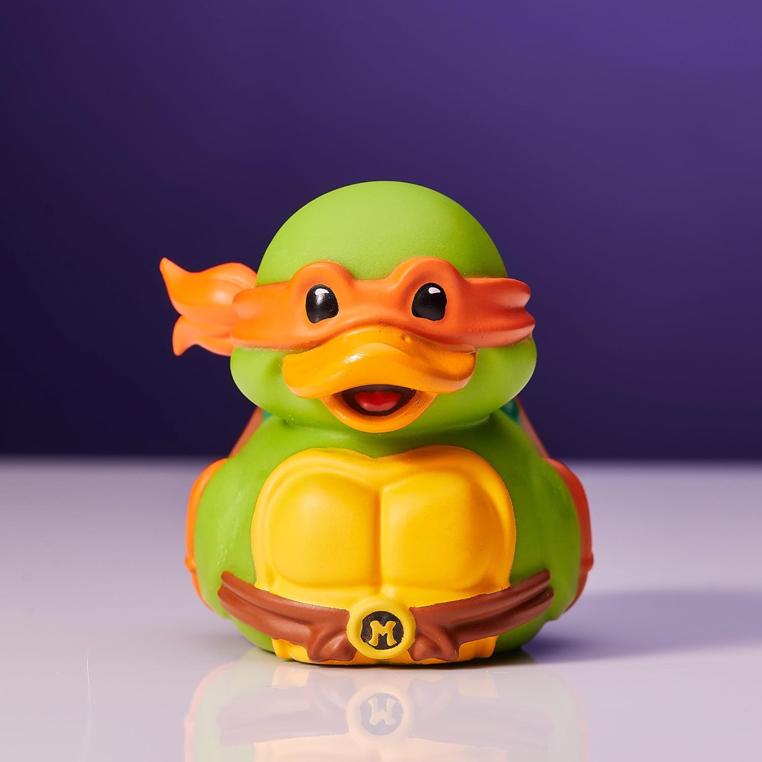 TUBBZ Mini: Teenage Mutant Ninja Turtles - Michelangelo Figura Mini Coleccionable de Pato de Goma Disfrazado