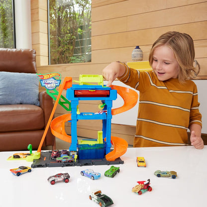 Hot Wheels City “Let's Race - ¡a correr!” Netflix -Túnel de lavado con giros Pista para coches de juguete, incluye 1 vehículo color shifter, +4 años (Mattel HTN80