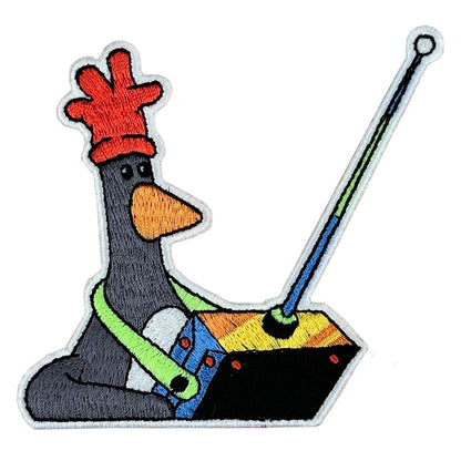 Pawprint Family | Feathers McGraw Remote Glow in The Dark Sew on Patch | Wallace and Gromit Official Merchandise