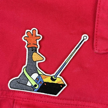 Pawprint Family | Feathers McGraw Remote Glow in The Dark Sew on Patch | Wallace and Gromit Official Merchandise