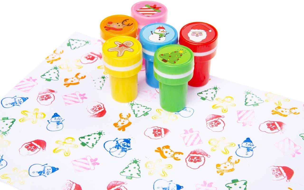 DUCKIEZ Christmas ink stamps. 6 designs in total, designs picked at random. Perfect party bag filler and kids gift. 60 pieces.