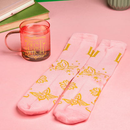 Paladone Wicked Movie Glass Mug & Socks Gift Set - Officially Licensed Disney Gift for Wicked Fans, Pink Tinted The Best Witch of All Mug & Cozy Emerald City Ankle Socks