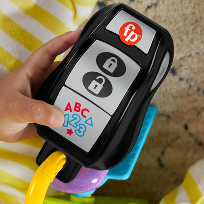 Fisher-Price Lern- und Spielspaß Baby Musikspielzeug Lernspaß Schlüsselbund mit Beißring und Spiegel für Kinder ab 6 Monaten, mehrsprachige Version, HWY37
