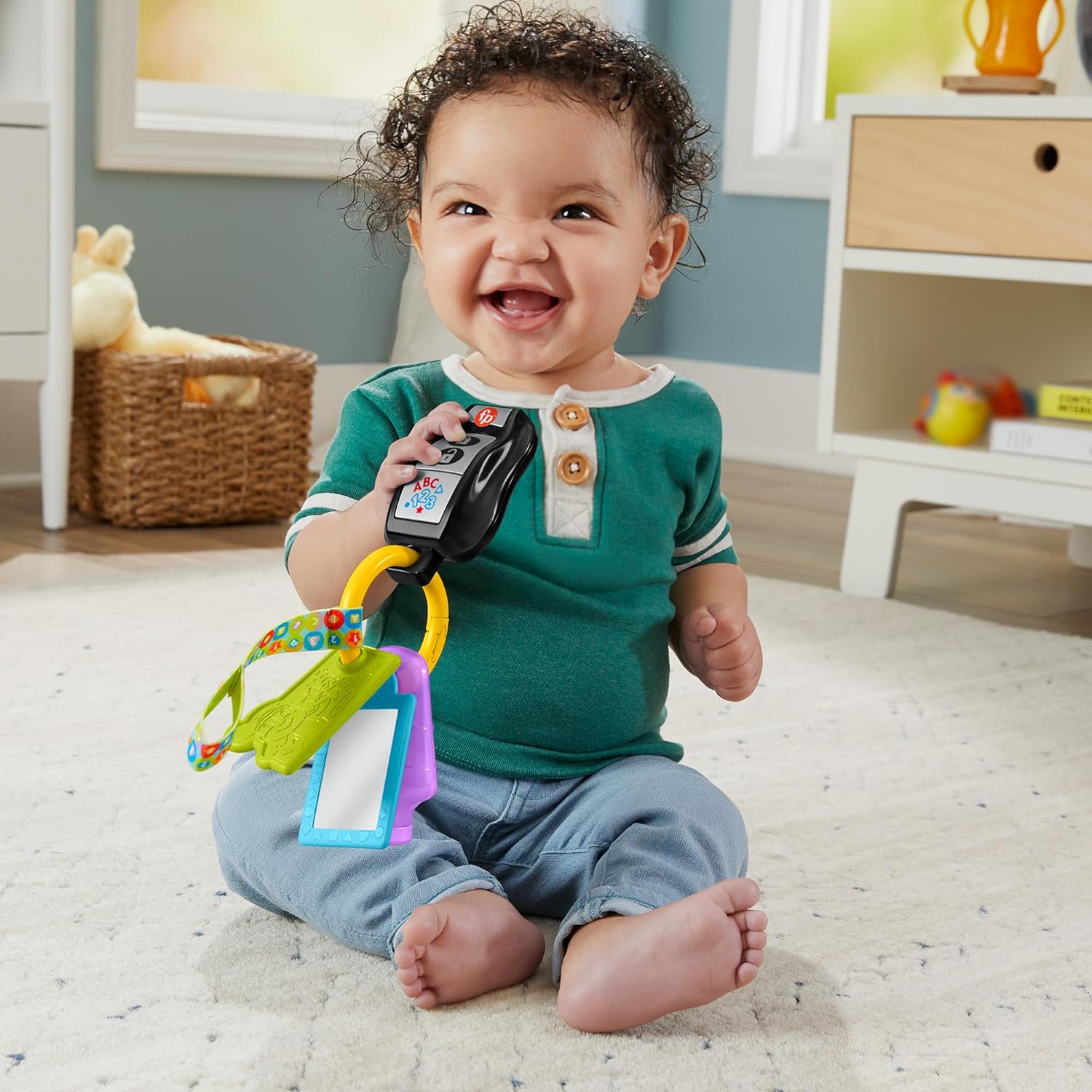 Fisher-Price Lern- und Spielspaß Baby Musikspielzeug Lernspaß Schlüsselbund mit Beißring und Spiegel für Kinder ab 6 Monaten, mehrsprachige Version, HWY37