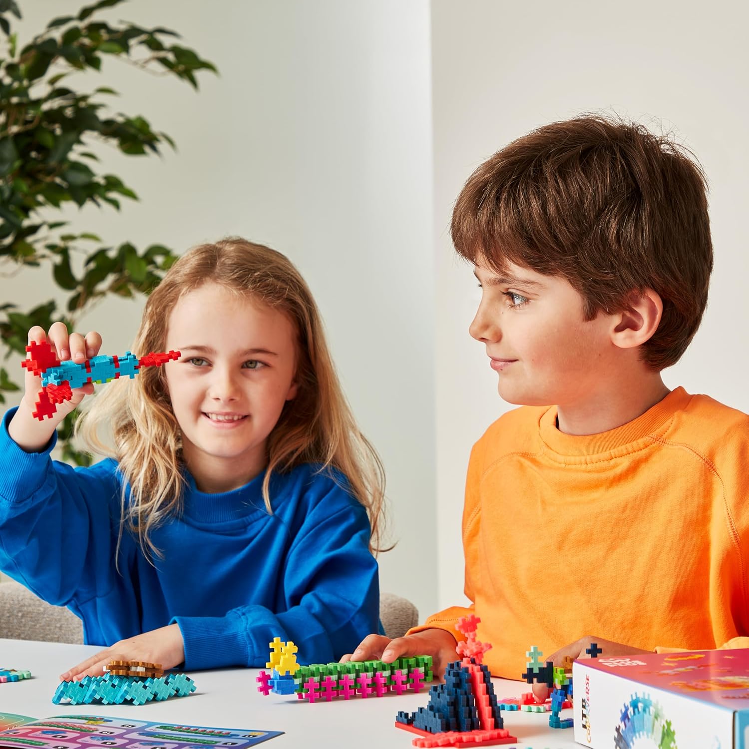 Plus Plus Building Blocks Toy - Learn to Build Colorverse, Includes 1000 Colourful Pieces, 6 Baseplates and 10 Wheels, Kids Construction Toys, STEM Learning Resources - Girls and Boys Toys Age 5 Plus