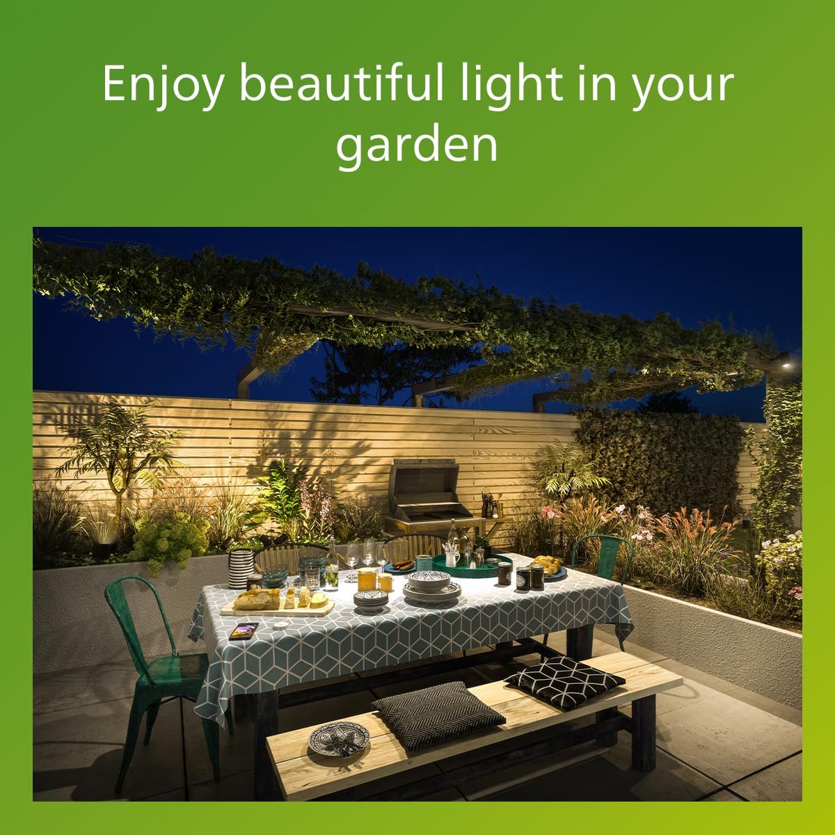 The Philips Karp LED outdoor wall light in anthracite grey suspends a large panel of diffuse warm white light in an elegant frame of