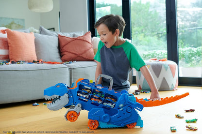 Hot Wheels City “Let's Race - ¡a Correr!” Netflix - Camión T-Rex definitivo Dinosaurio Transporte y Pista para Coches de Juguete, Incluye 2 vehículos, +4 años (Mattel HNG50)