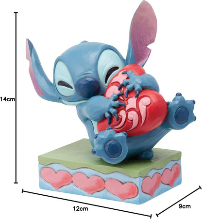Enesco Jim Shore Stitch - Statuetta a forma di cuore che abbraccia
