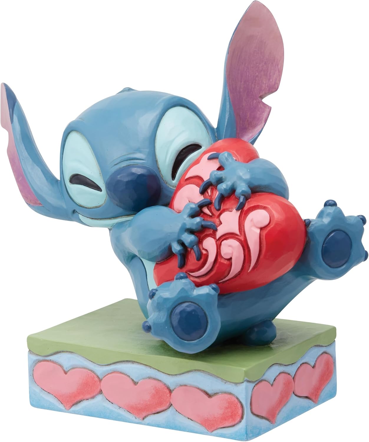 Enesco Jim Shore Stitch - Statuetta a forma di cuore che abbraccia