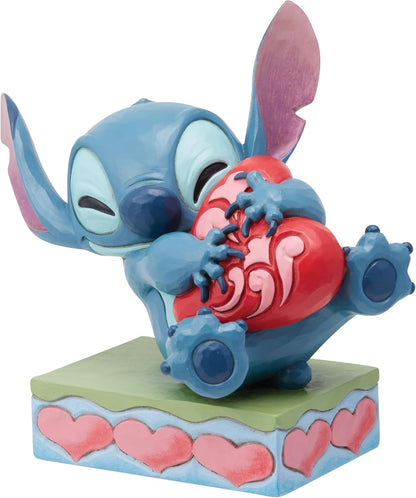 Enesco Jim Shore Stitch - Statuetta a forma di cuore che abbraccia