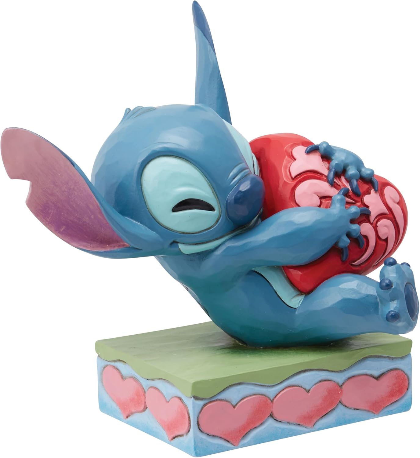 Enesco Jim Shore Stitch - Statuetta a forma di cuore che abbraccia