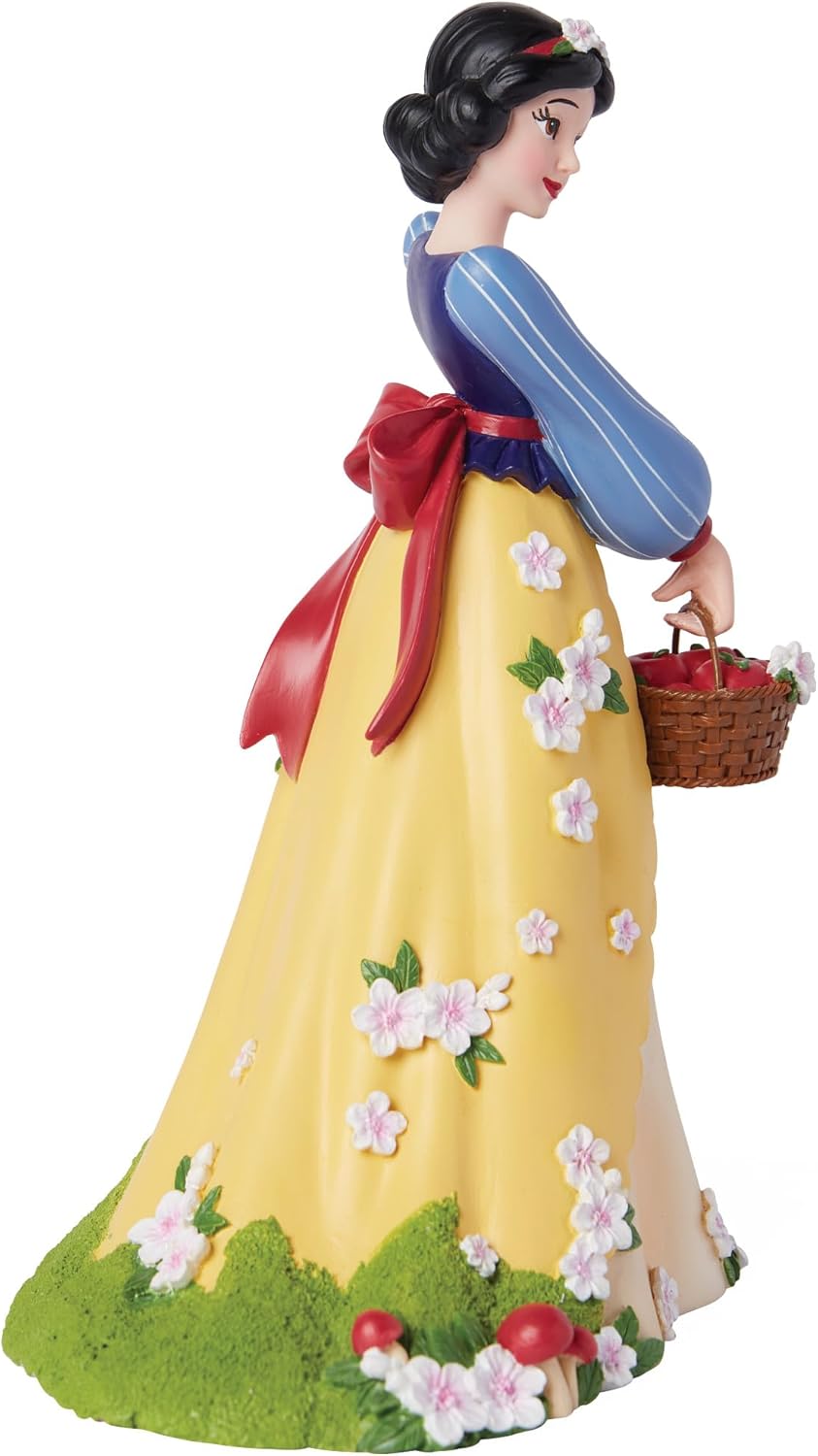 Enesco Disney Showcase, statuetta botanica di Biancaneve che tiene un cesto di mele, 20 cm, multicolore