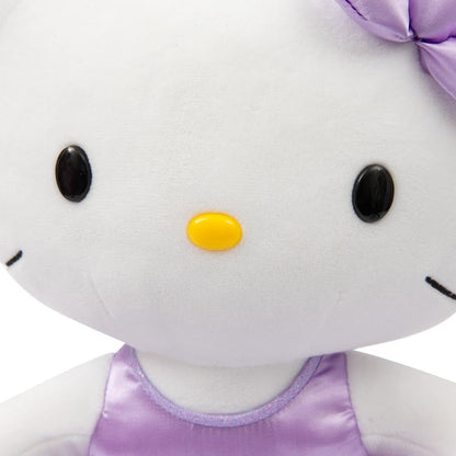 Hello Kitty Giochi Preziosi - Peluche Suave de 30 cm de Altura con Atuendo a la Moda, Vestido Morado Satinado y Lazo a Juego, para niños a Partir de 3 años