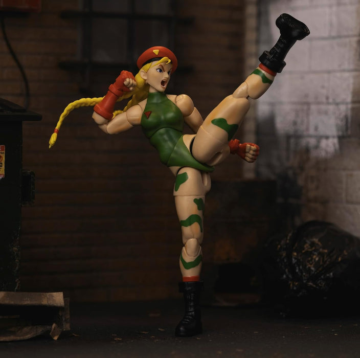 Jada - Figura articulada del Personaje de Street Fighter Cammy de 15 cm. con Manos y Cabeza Intercambiables, Accesorios y 20 Puntos articulados. Videojuegos Street Fighter. (253252033)