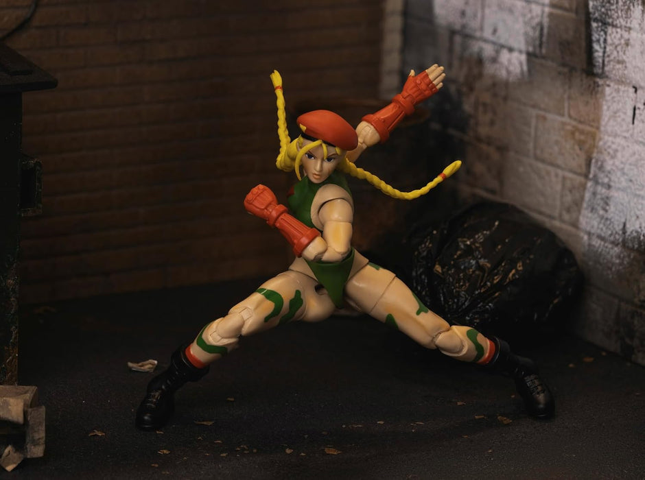 Jada - Figura articulada del Personaje de Street Fighter Cammy de 15 cm. con Manos y Cabeza Intercambiables, Accesorios y 20 Puntos articulados. Videojuegos Street Fighter. (253252033)