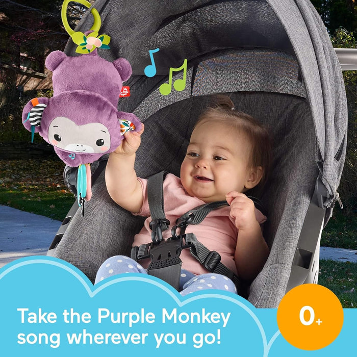 Fisher-Price Baby Stroller Toy Sing & Go Purple Monkey Musical Sensory Plush with Crinkle & Clackers for Newborns from Birth+, JBG94