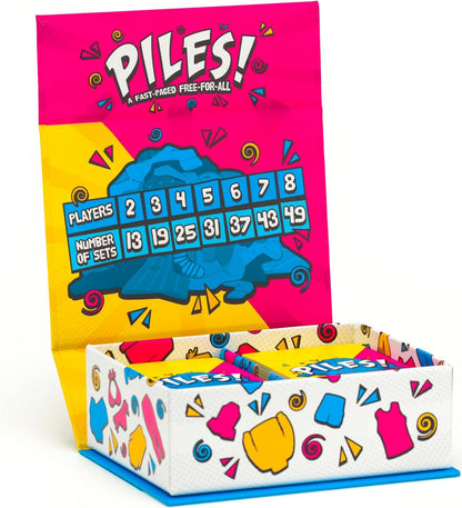Lost Boy Entertainment - Piles - Juegos de Cartas - Juegos Familiares - para niños de 8 años en adelante - Juegos para Adultos - Noche de Juegos Familiares - Juegos de Viaje