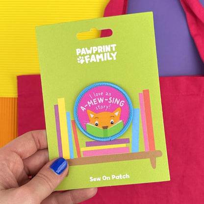 Pawprint Family | I Love an A-mew-Sing Story Sew on Patch | World Book Day Official Merchandise