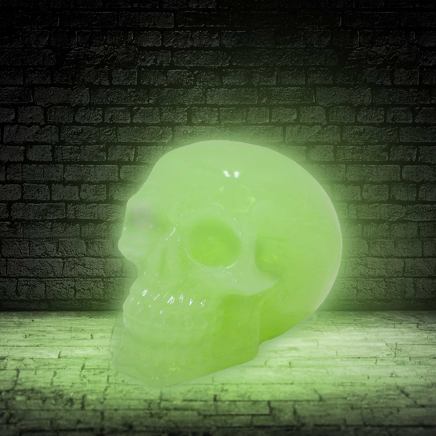 Nemesis Now Phosphorescent Skull 8cm, Medium, Resin, White, Glow in the Dark Skull Ornament, Luminous Green Glowing Skull, Macabre Home Décor, Cast in the Finest Resin