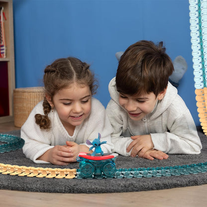 Smoby - Stitch FleXtreme - 4 meter 40 autocircuit - 184 flexibele en modulaire sporen + 1 voertuig Stitch lichteffecten - batterijen inbegrepen - 7600180927