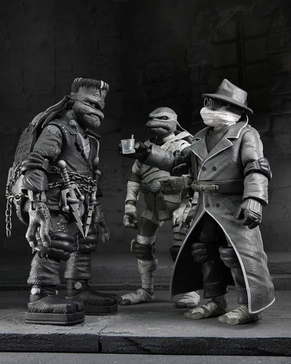 NECA - Monstruos universales/Tortugas Ninja Mutantes Adolescentes - Figura de acción a escala de 7 pulgadas - Paquete de 4 tortugas en blanco y negro