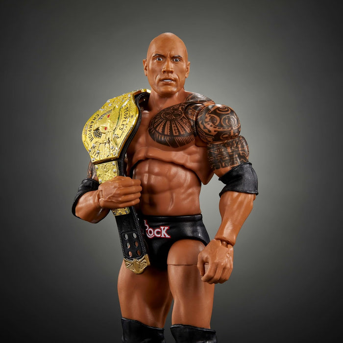 Mattel WWE Ultimate Edition - Figura de acción y accesorios, juego coleccionable The Rock de 6 pulgadas, cabezas y manos intercambiables, 30 puntos de articulación