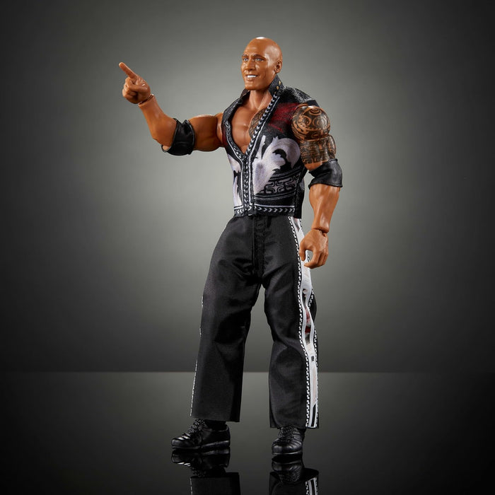 Mattel WWE Ultimate Edition - Figura de acción y accesorios, juego coleccionable The Rock de 6 pulgadas, cabezas y manos intercambiables, 30 puntos de articulación