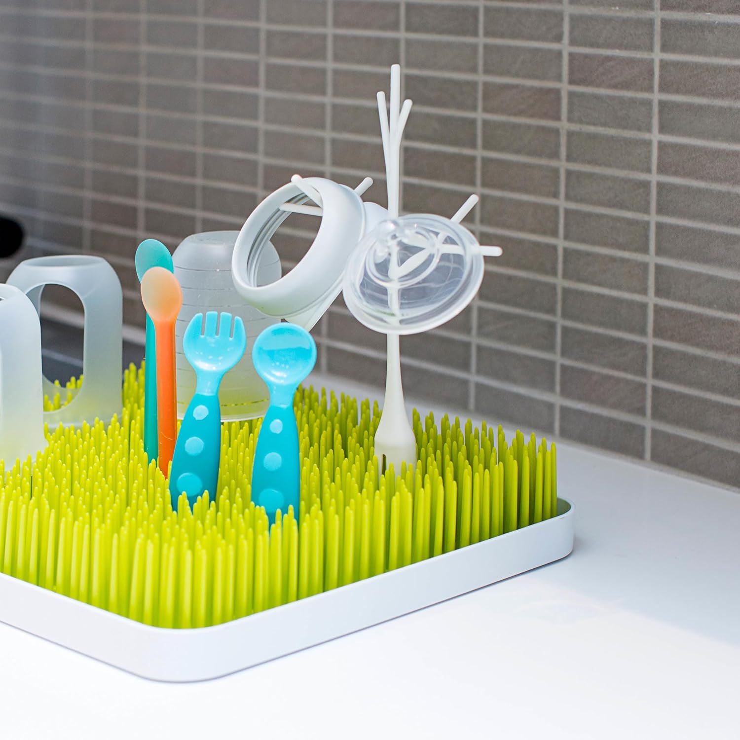 Boon Nursery Accessories Starter Bundle | Includes x5 Pieces: Stylish Grass Baby Bottle Dryer Rack, Baby Bottle Brush, 2x Large Bottle Adaptors and Spoon