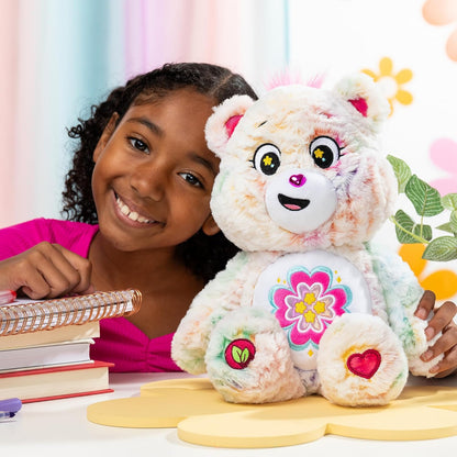 Care Bears Peluche moyenne (respectueuse de l'environnement) – Ours en forme de cœur en fleurs