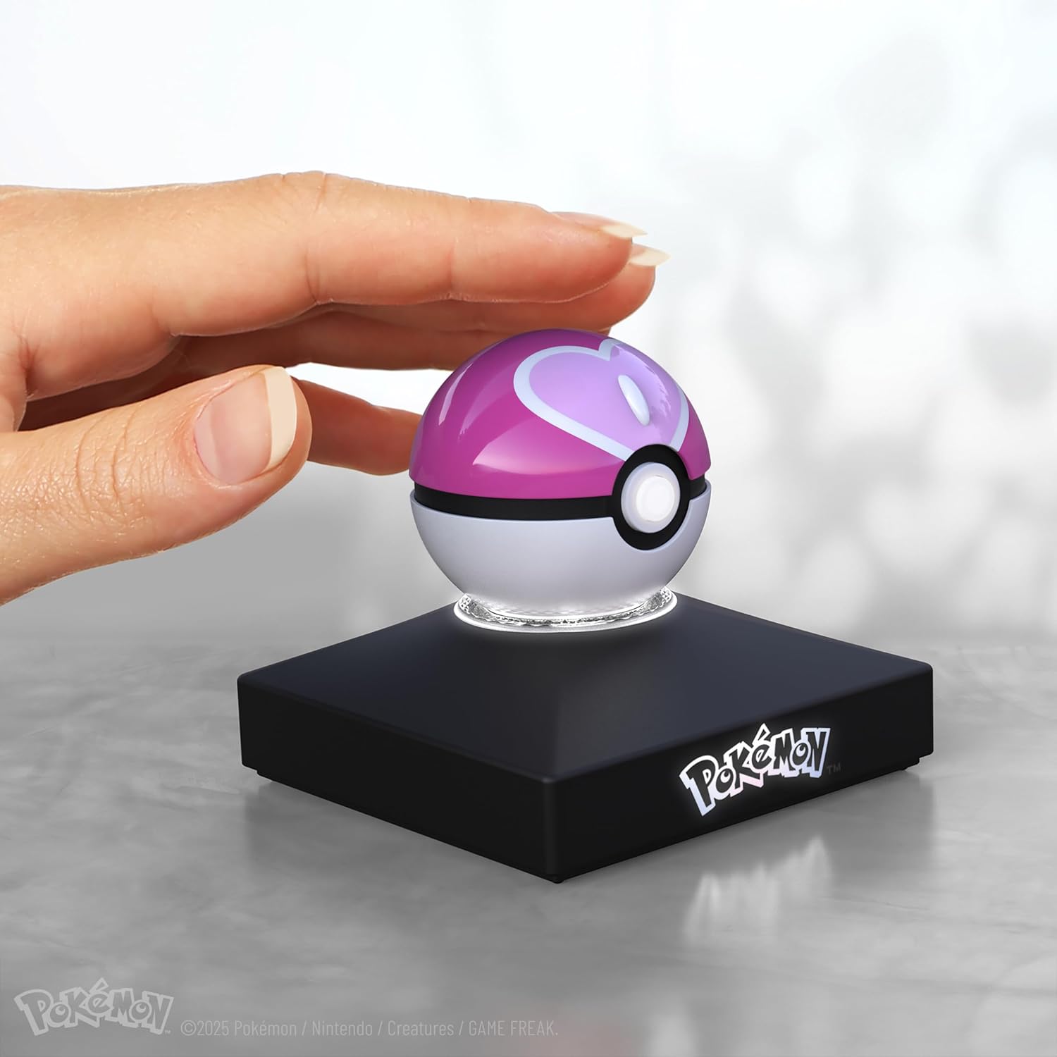 The Wand Company Pokémon Trainer Mini Poké Ball Range of Authentic Replicas - Realistic, Electronic, Die-Cast Poké Ball with Display Stand Light Features