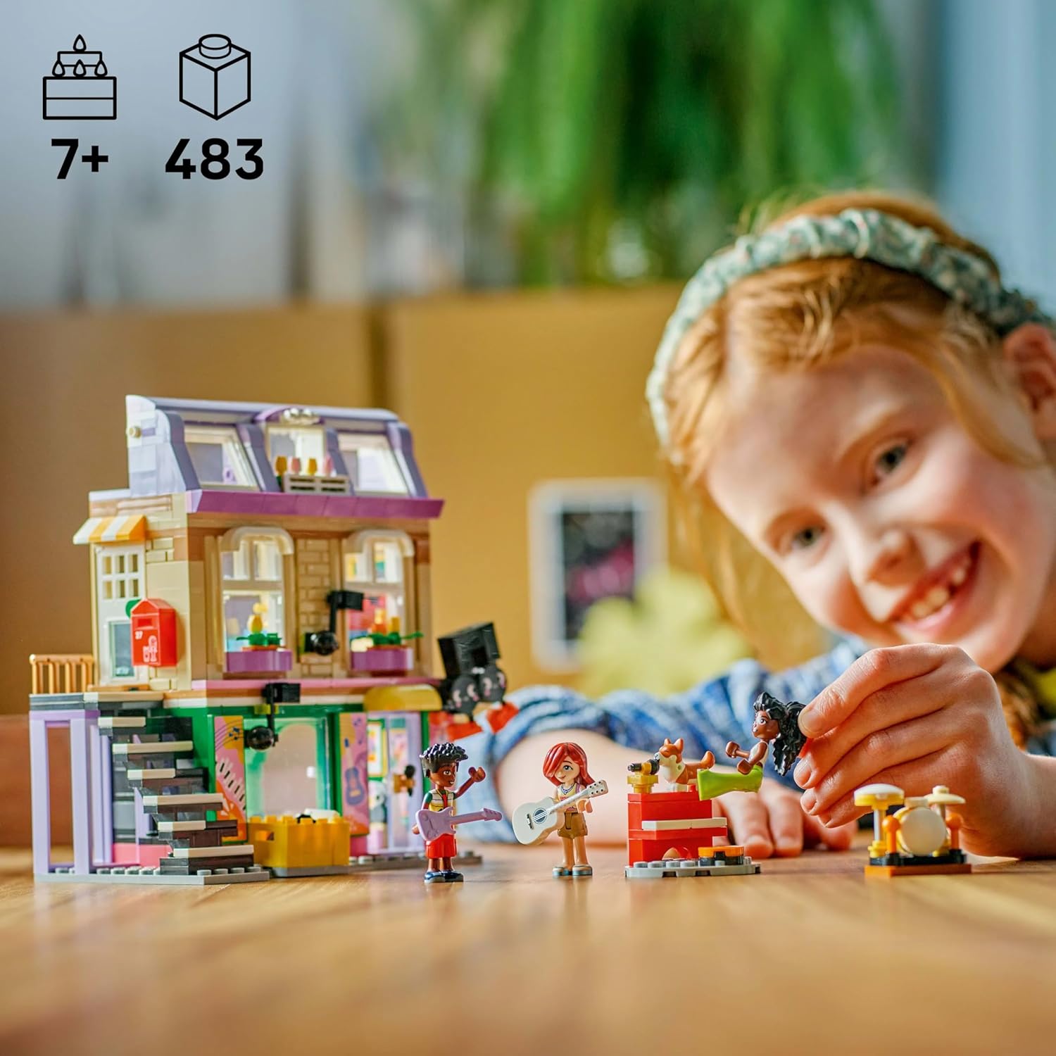 LEGO Friends Negozio di Musica e Appartamento Giocattolo con 3 Mini Bamboline, Animale Domestico Corgi e Strumenti Musicali come Pianoforte, Batteria e Chitarre - Regalo per Bambine da 7 Anni - 42653