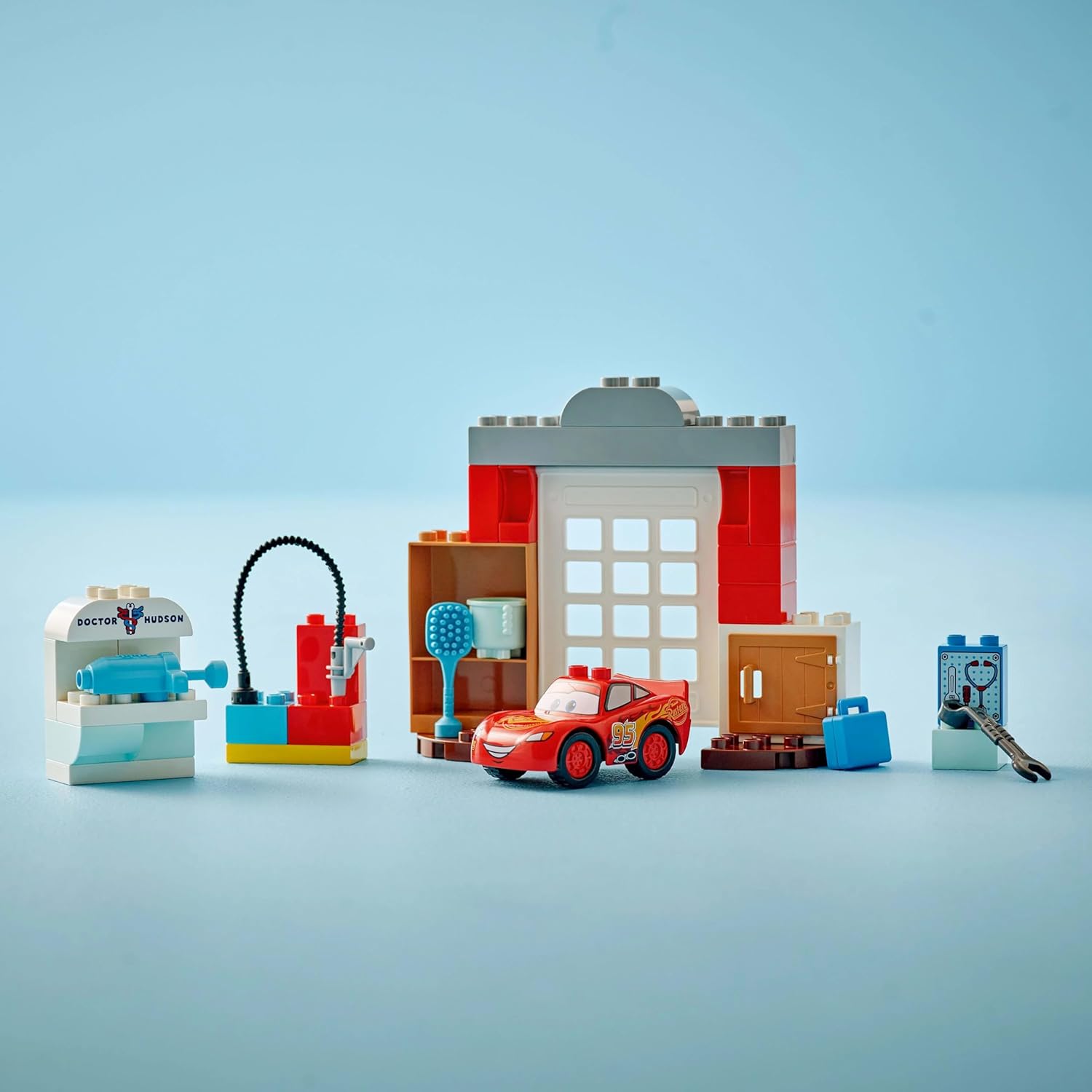 LEGO DUPLO│Disney and Pixar McQueen's Visit to Doc's Garage - incl. a Race Car Toy for Toddlers, Car Wash Tools & Accessories - Gift for 2+ Year Old Boys & Girls - 10456