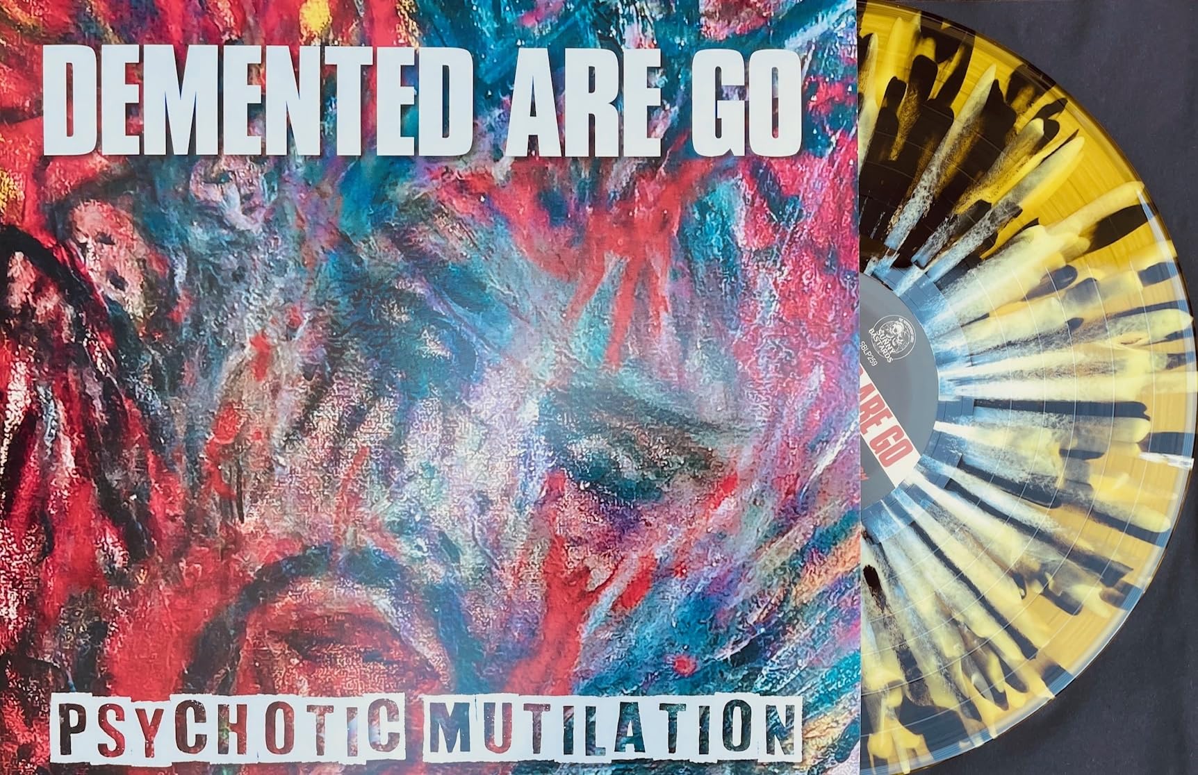 Psychotic Mutilation (Clear Yellow W/ B'N'W Splatter