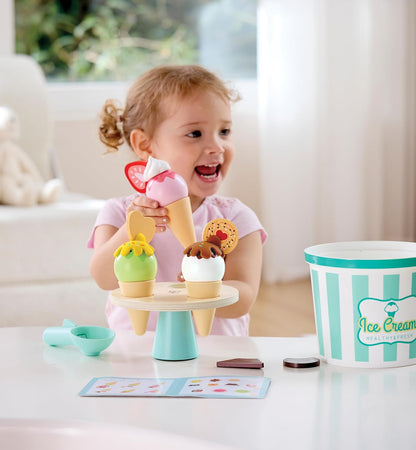 Hape Scoop & Serve Ice Cream Set | Wooden Pretend Food Toy with Bucket, Scoop, Rotating Display Machine, Cones & Accessories | Educational Role Play Dessert Playset for Kids