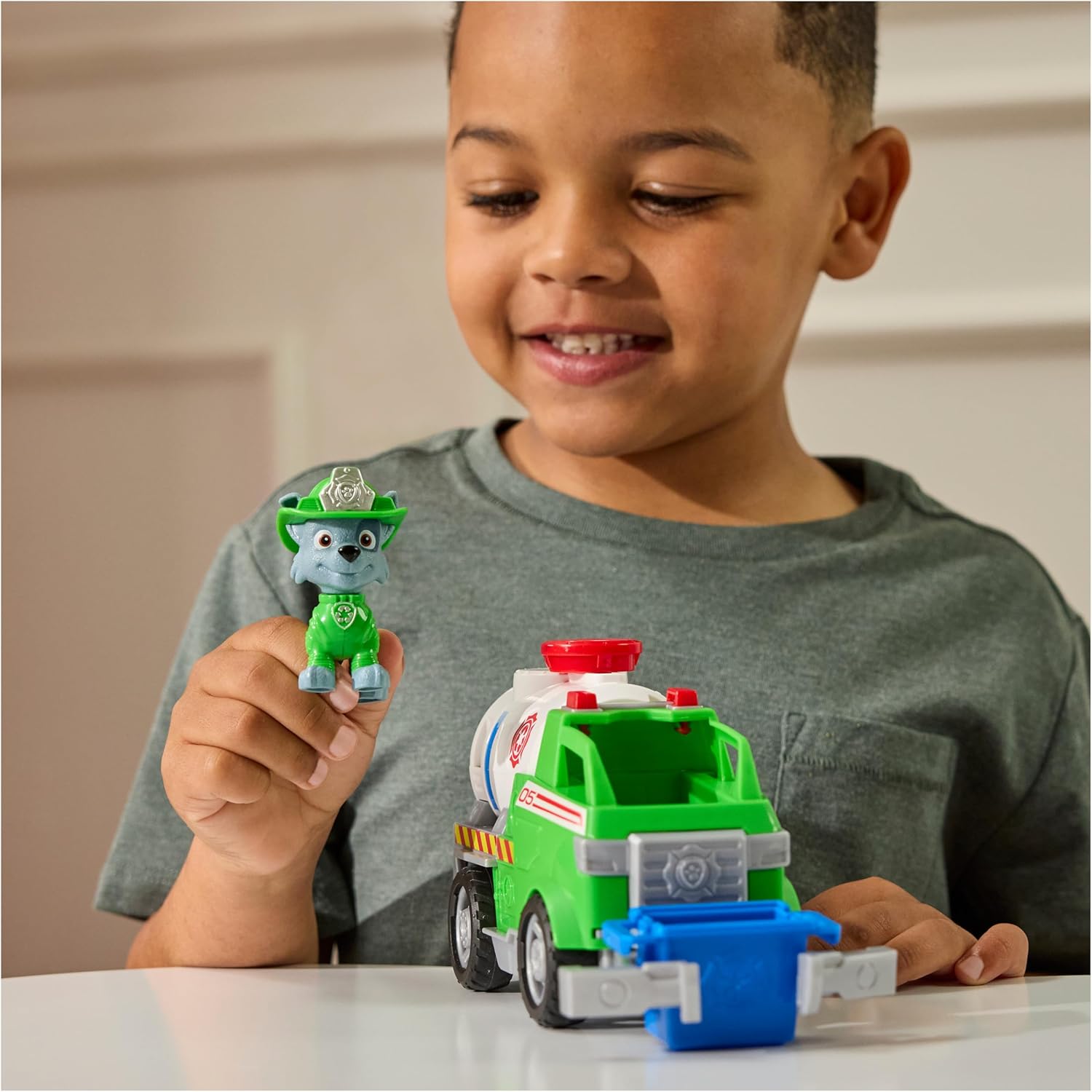 Paw Patrol Fire Rescue: Rocky Rescue Fire Tanker with Action Figure, Grab Claw and Toy Truck, Kids Toys for Boys and Girls Ages 3 and Up