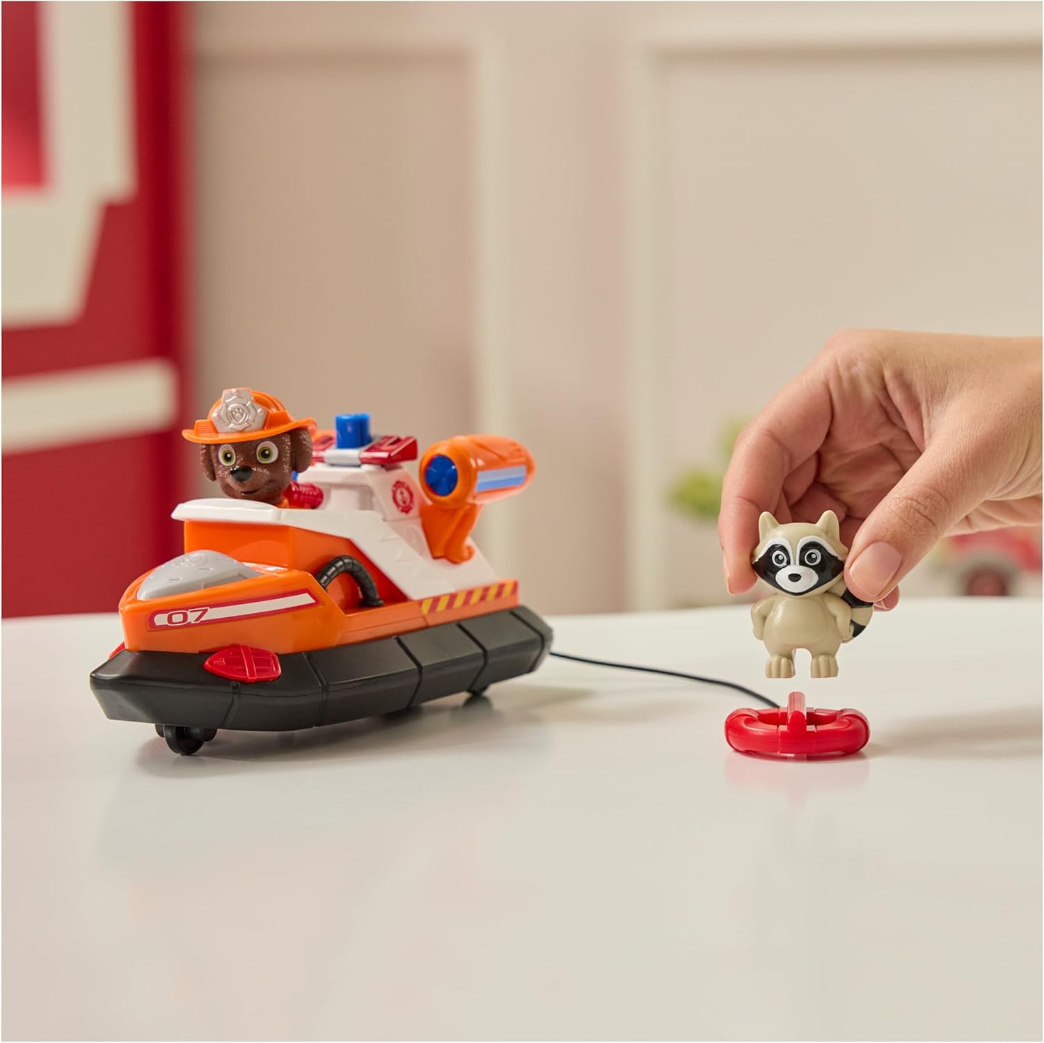 Paw Patrol Fire Rescue: Zuma Rescue Fire Boat with Action Figure, Launching Lifesaver, Raccoon and Toy Boat, Kids Toys for Boys and Girls Ages 3 and Up