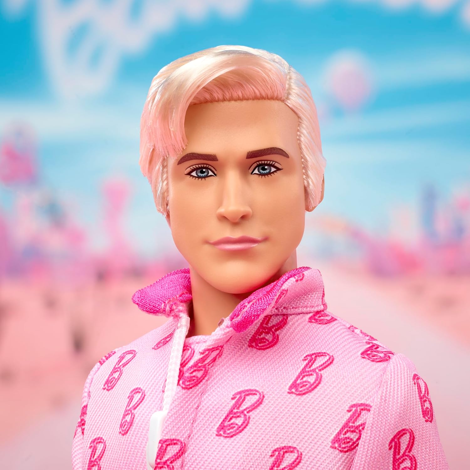 Barbie The Movie Ken Collectible Doll, Ryan Gosling as Ken Wearing Pink Jumpsuit with “B” Detail With White Sneakers and MultiColor Roller Skates, JCP80
