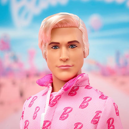 Barbie The Movie Ken Collectible Doll, Ryan Gosling as Ken Wearing Pink Jumpsuit with “B” Detail With White Sneakers and MultiColor Roller Skates, JCP80