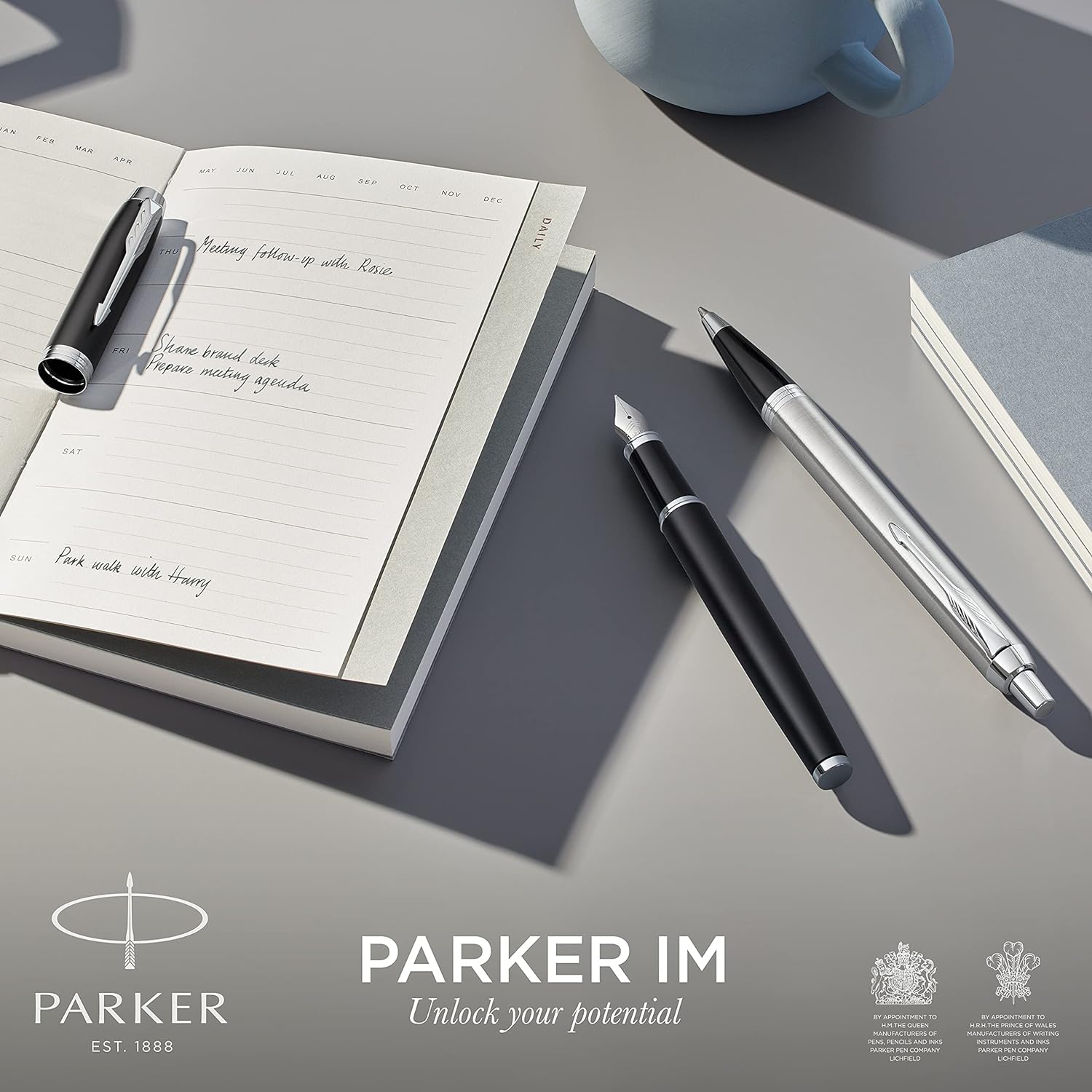 Parker IM Ballpoint Pen, Black Lacquer Chrome Trim with Medium Point Blue Ink Refill (1931665