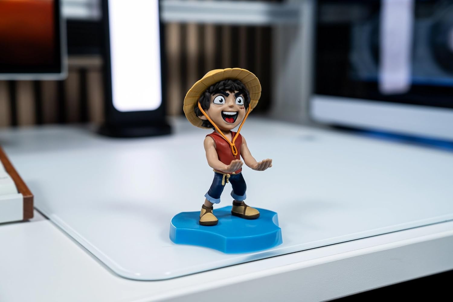 Cableguys Minis One Piece Luffy Phone Stand & Earbuds Holder - Novelty Phone Stand for Desk and Bedside, In Ear Headphone Holder for Smartphone & Small Devices, Desk Decor and Mobile Accessories