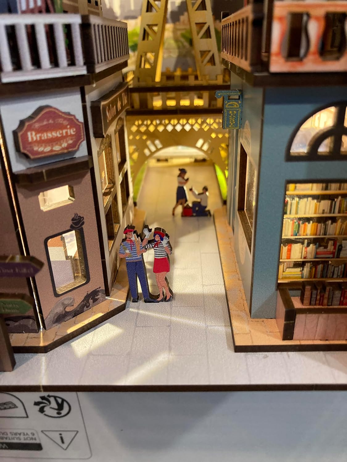 Revell Paris: Tiny Adventures Paris Book Nook - Magical Miniature World for Your Bookshelf, 168 Laser-Cut Wooden Parts with fine details Atmospheric LED Ambient Lighting
